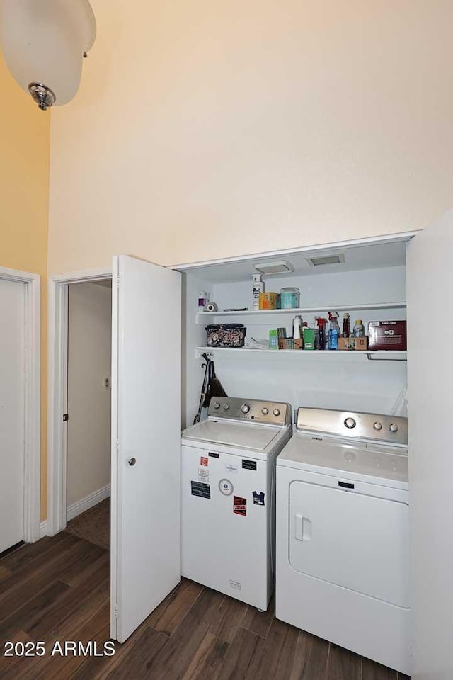 9235 N 101st St, Scottsdale, AZ 85258 - laundry area featuring washing machine and dryer and dark wood-style floors