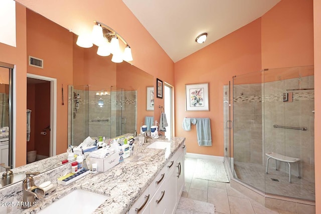 9235 N 101st St, Scottsdale, AZ 85258 - bathroom with double vanity, high vaulted ceiling, and a shower stall