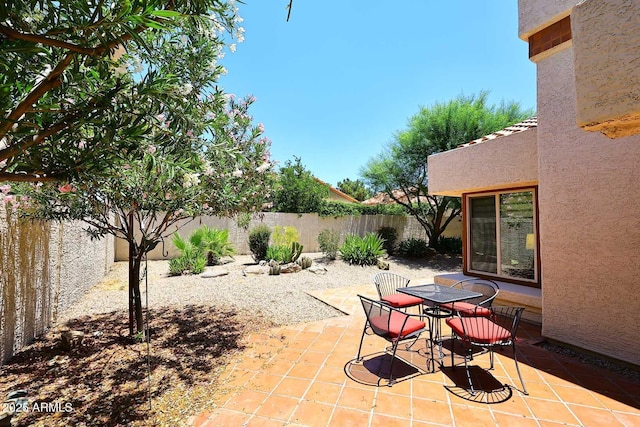 9235 N 101st St, Scottsdale, AZ 85258 - fenced backyard with a patio area and outdoor dining space