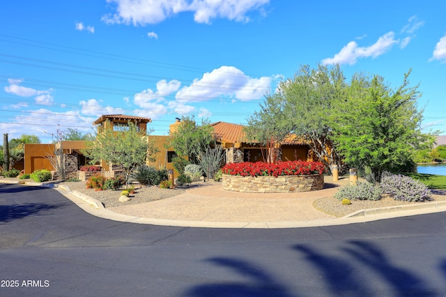 9235 N 101st St, Scottsdale, AZ 85258 - view of front facade with stucco siding and a tile roof