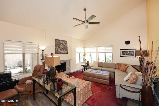 9235 N 101st St, Scottsdale, AZ 85258 - living area featuring a ceiling fan, a fireplace, wood finished floors, and high vaulted ceiling