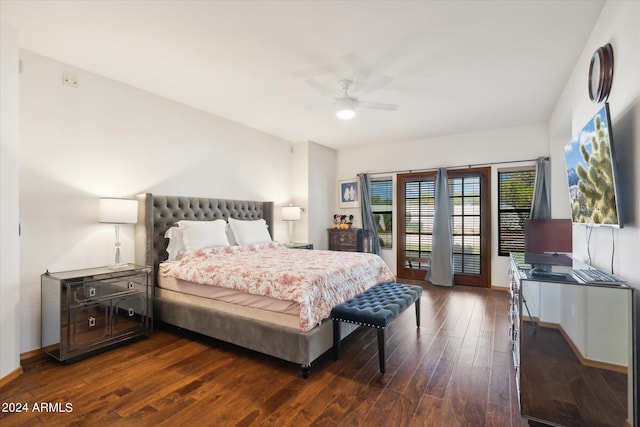 bedroom featuring dark hardwood / wood-style flooring and ceiling fan