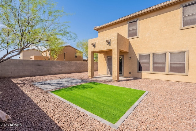 17313 N 185th Dr, Surprise, AZ 85374 - back of house featuring a patio, a fenced backyard, and stucco siding