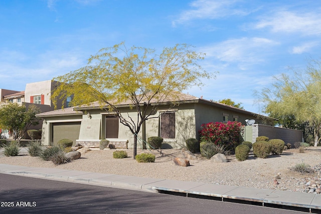 view of front of property featuring a garage