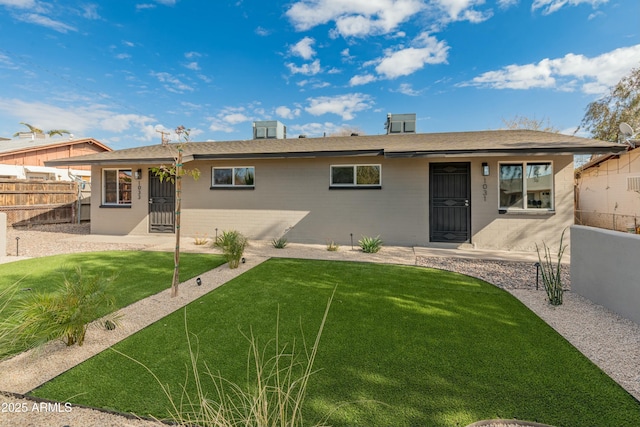 single story home featuring a front yard