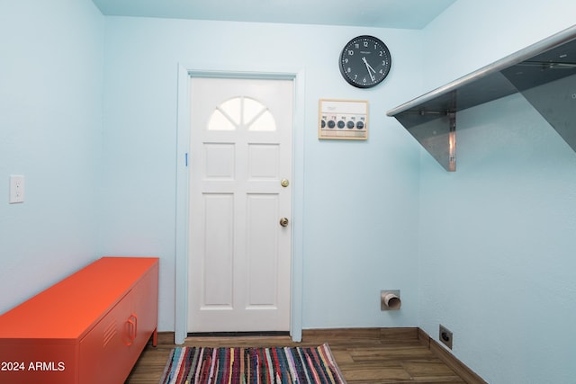 laundry room featuring dark wood-type flooring