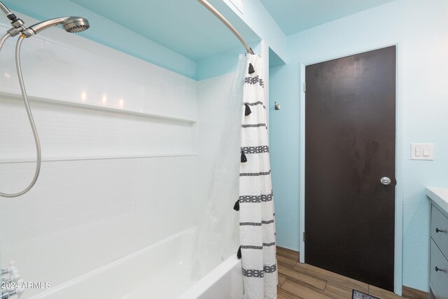 bathroom with vanity and shower / bath combo