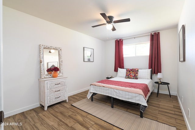 bedroom featuring hardwood / wood-style flooring and ceiling fan