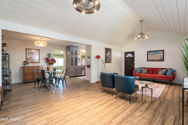 living room featuring an inviting chandelier, vaulted ceiling, and wood ceiling