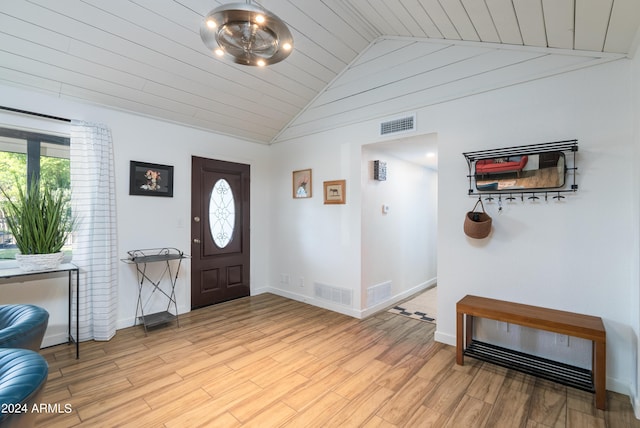 foyer entrance with light wood-type flooring, wooden ceiling, and lofted ceiling