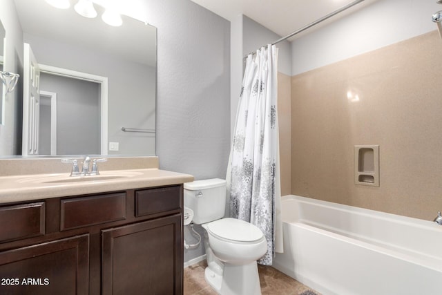 bathroom with toilet, shower / bath combo, and vanity