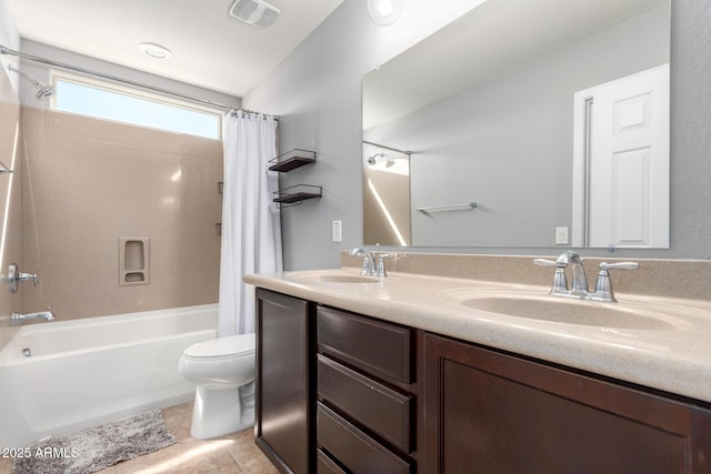 full bathroom with visible vents, shower / bathtub combination with curtain, a sink, and toilet