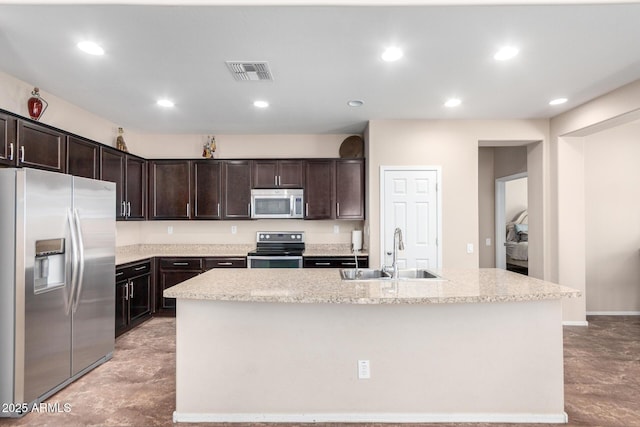 kitchen with a sink, appliances with stainless steel finishes, visible vents, recessed lighting, and dark brown cabinets