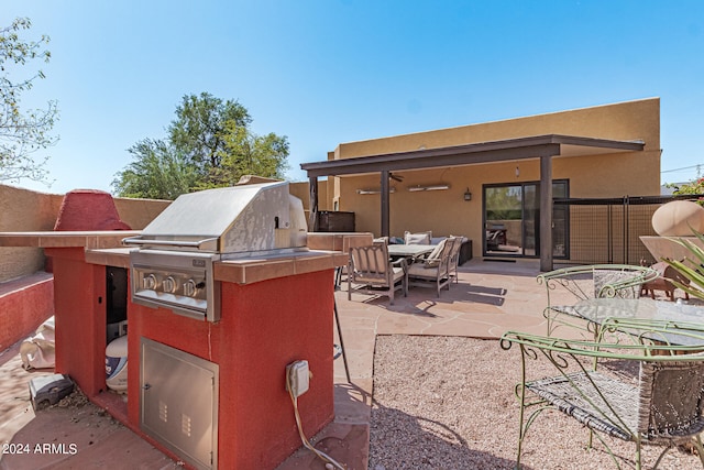 view of patio / terrace with exterior kitchen