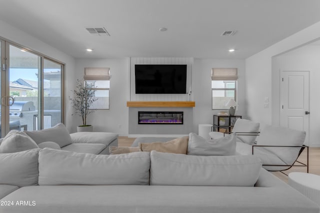 living room with light hardwood / wood-style floors