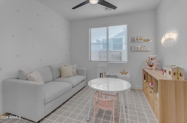 living room featuring ceiling fan