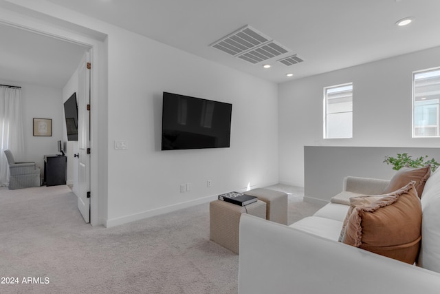 living room with light colored carpet