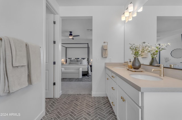 bathroom with vanity and ceiling fan