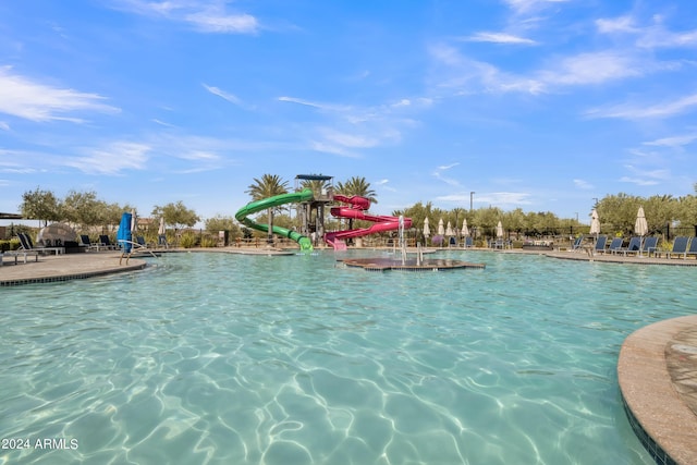 view of pool featuring a water slide