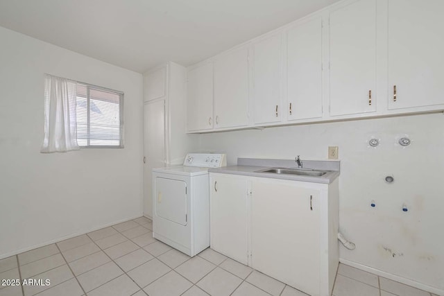 clothes washing area featuring washer / clothes dryer, cabinet space, light tile patterned floors, and a sink