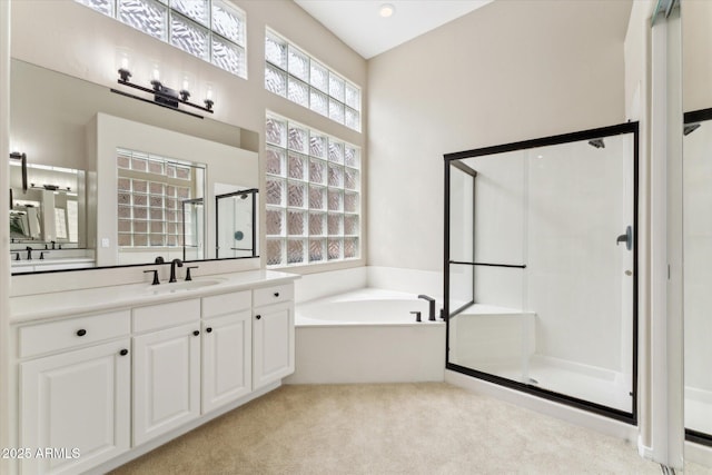 16615 N 109th Pl, Scottsdale, AZ 85255 - bathroom with a garden tub, vanity, carpet floors, and a shower stall
