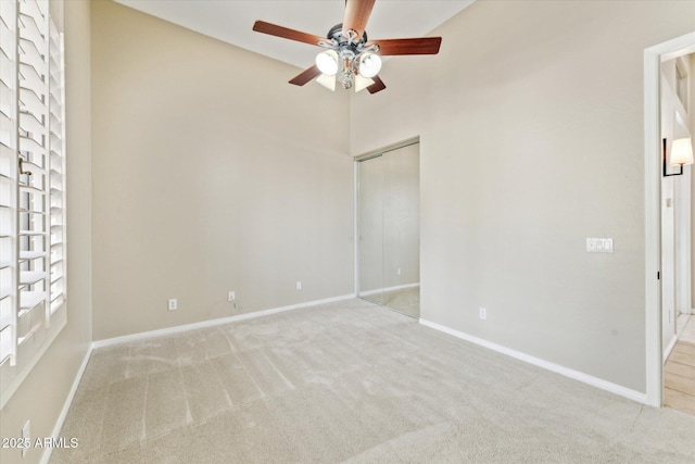 16615 N 109th Pl, Scottsdale, AZ 85255 - unfurnished bedroom featuring baseboards, carpet flooring, and a closet