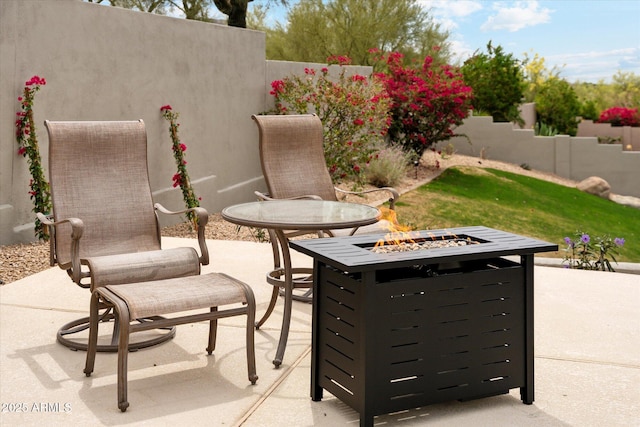 16615 N 109th Pl, Scottsdale, AZ 85255 - view of patio / terrace with a fire pit
