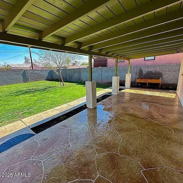 view of patio with a fenced backyard