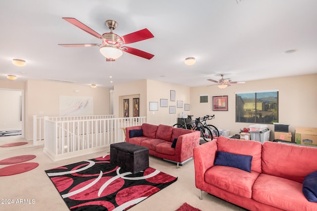 living room with light carpet and ceiling fan