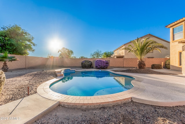 view of swimming pool featuring a patio