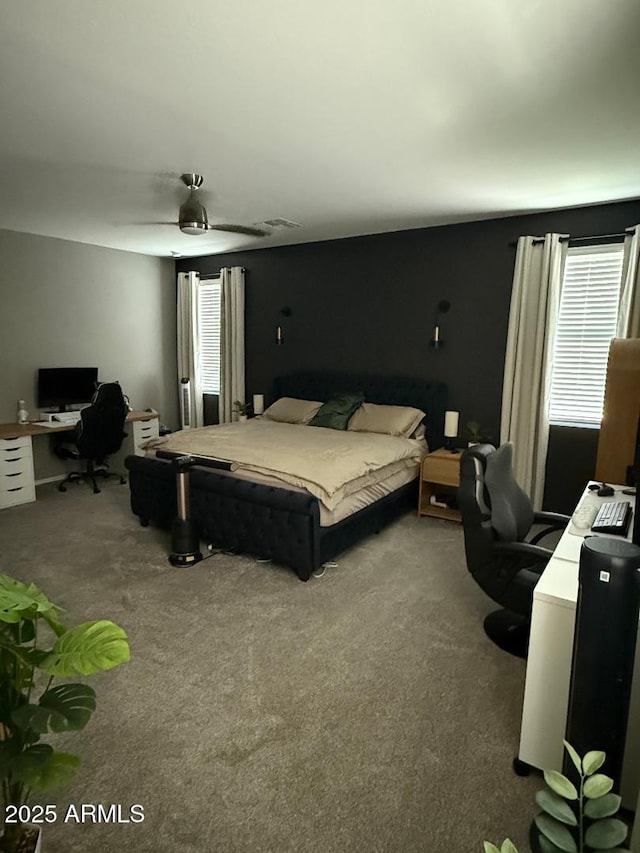 1418 E Jacqueline Pl, Casa Grande, AZ 85122 - bedroom with a desk, multiple windows, and carpet