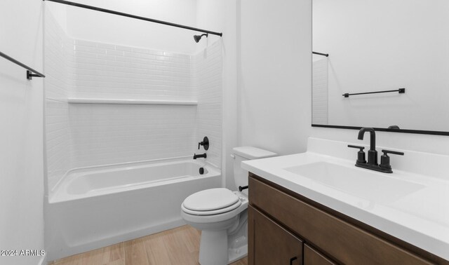 full bathroom with vanity, shower / bath combo with shower curtain, and toilet