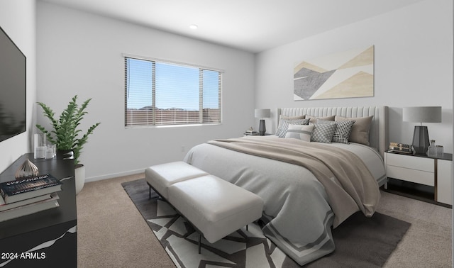 bedroom featuring carpet floors and baseboards