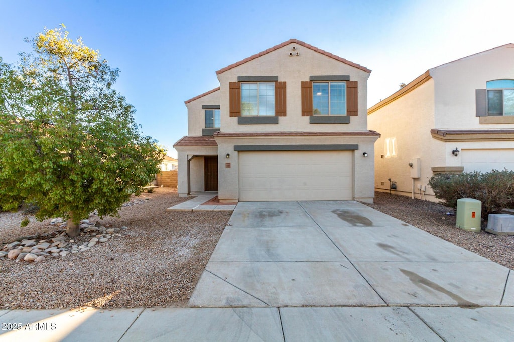 view of front of property with a garage