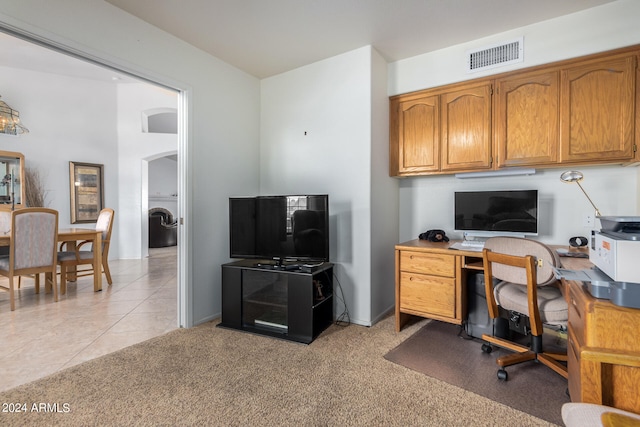 carpeted office with washer / clothes dryer