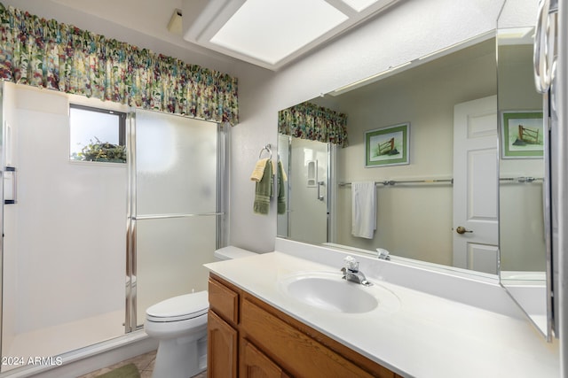 bathroom featuring walk in shower, toilet, tile floors, and large vanity