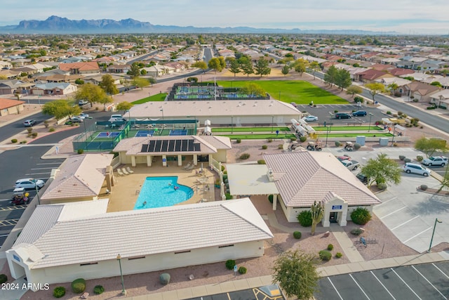 birds eye view of property featuring a mountain view