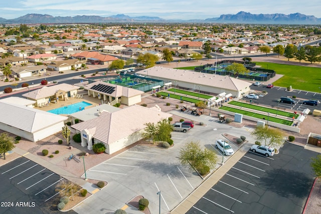 birds eye view of property featuring a mountain view