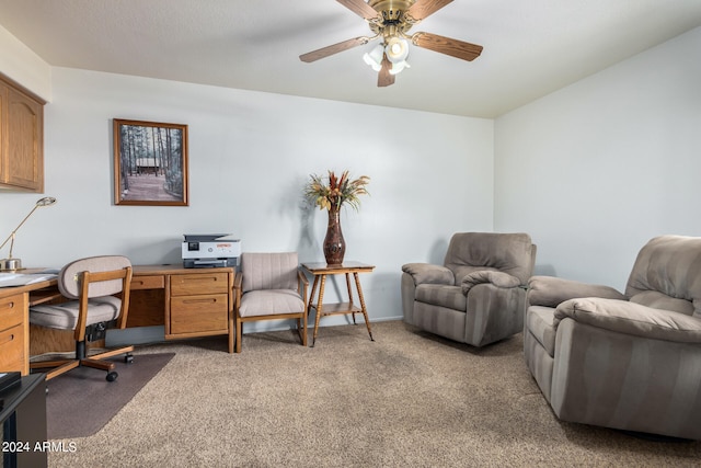 office area with light carpet and ceiling fan