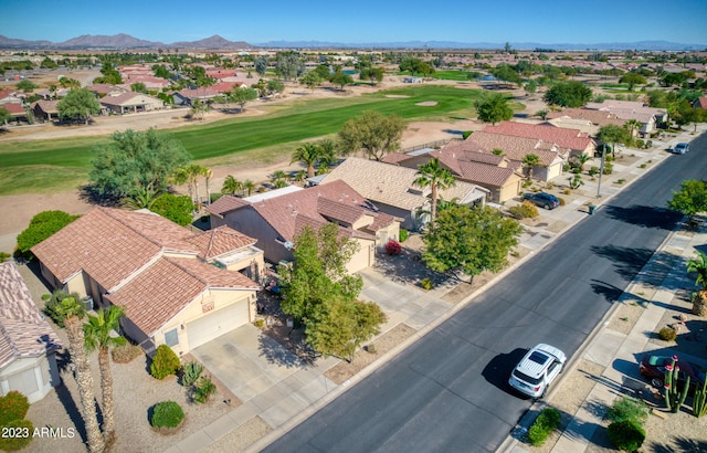 birds eye view of property featuring a mountain view