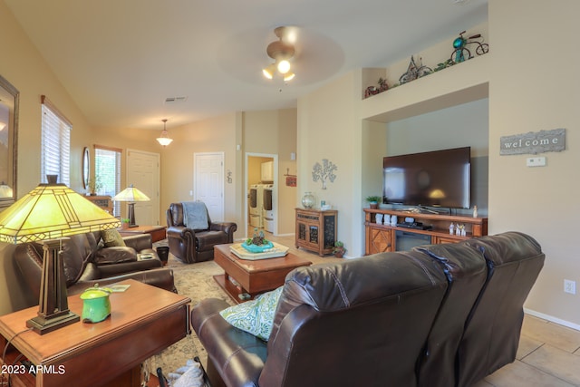 tiled living room with ceiling fan