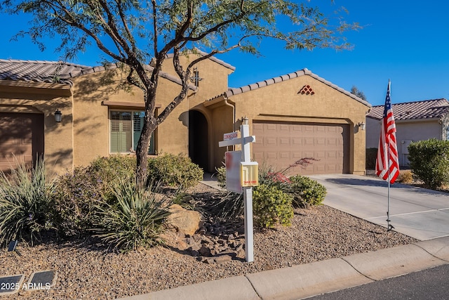 view of front of property with a garage