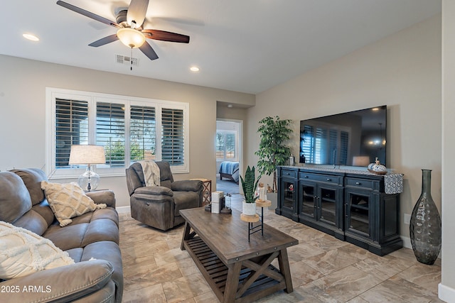 living room with ceiling fan