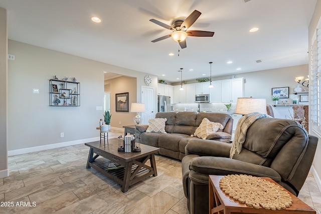 living room featuring ceiling fan