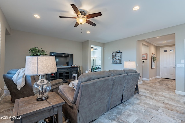 living room with ceiling fan