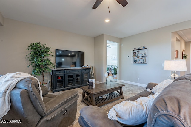 living room with ceiling fan