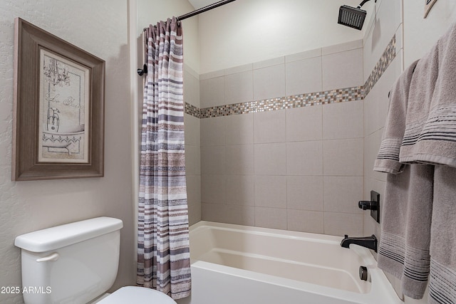 bathroom featuring toilet and shower / tub combo