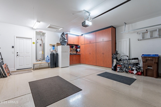 garage featuring electric water heater, white refrigerator, and a garage door opener