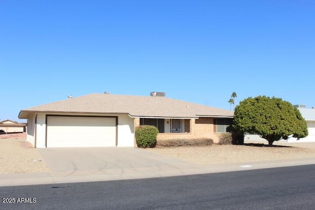 ranch-style house featuring a garage