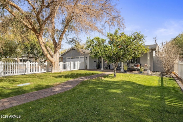 view of front facade with a garage and a front yard